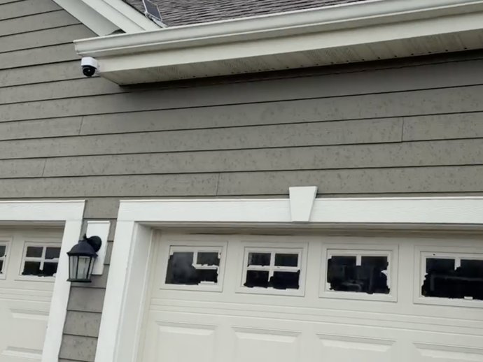 imageimage 5 Storm impact damage to siding and garage